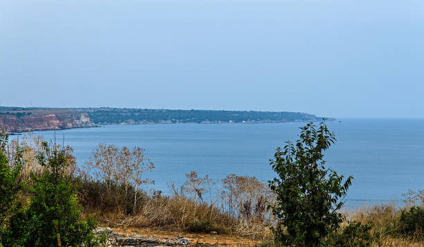 istock Green Thracian cliffs, Kaliakra Lighthouse, Black sea water, bulgarian coastline 1073008928
