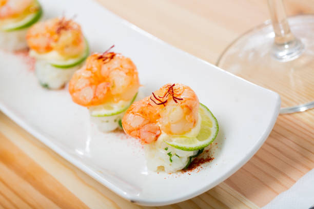 istock Roasted prawns on rice with saffron and lime 1073011446