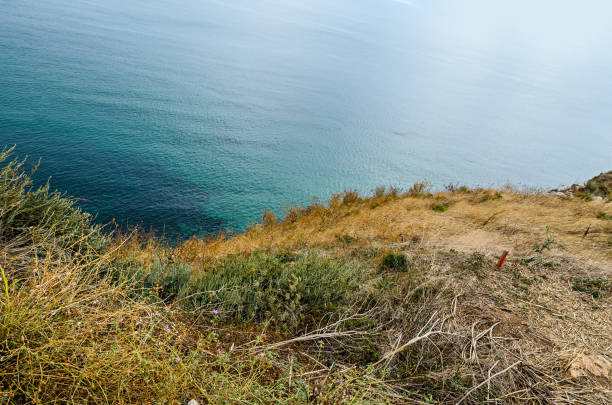 istock Green Thracian cliffs, Kaliakra Lighthouse, Black sea water, bulgarian coastline 1073015032