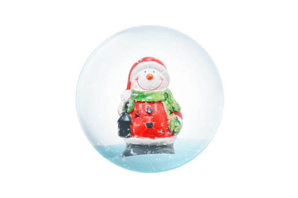 istock Isolated New Year magic ball with snowman and snow white. 1073018114