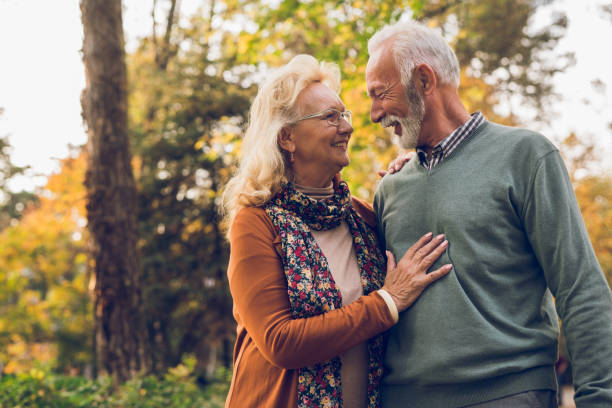 istock Senior couple taking a walk in the park 1073021094