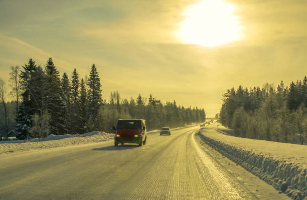istock Cars on the Winter Forest Road 1073023408