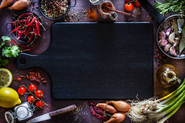 sfondo cottura e condimento - garlic cooking oil cutting board horizontal foto e immagini stock