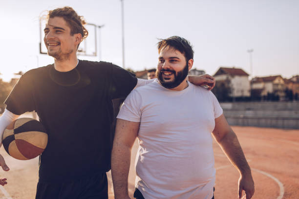 istock Two streetball friends 1073024190