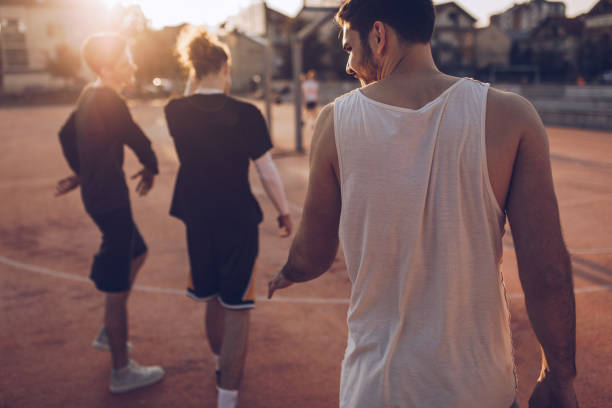 istock Men going to play streetball 1073024606