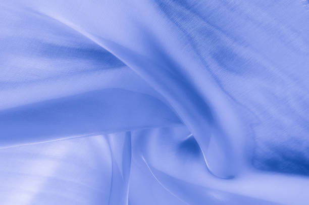istock Texture, background, pattern. Pale blue clear silk cloth. SKY BLUE, also known as PALE BLUE, BABY BLUE, POWDER BLUE 1073025536
