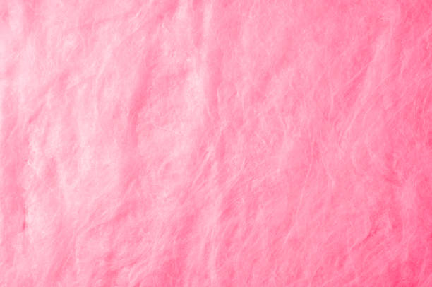 istock Texture background of fabric. Cotton pink fabric. Text space. Rose-colored fabric texture in close-up.  trend color rose quartz pink pastel tone - close up of elegant textile background 1073029286