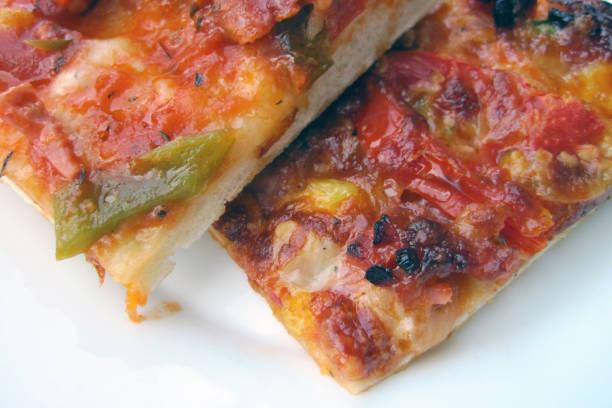 istock homemade pieces of pizza 1073032030
