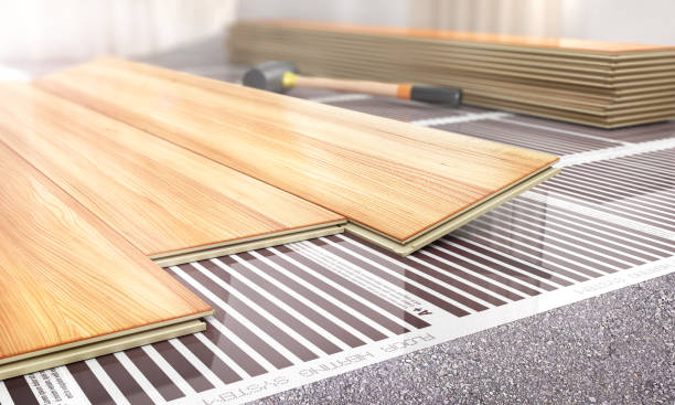 istock Warm floor. Infrared floor heating system under laminate floor. 3d illustration 1073032580