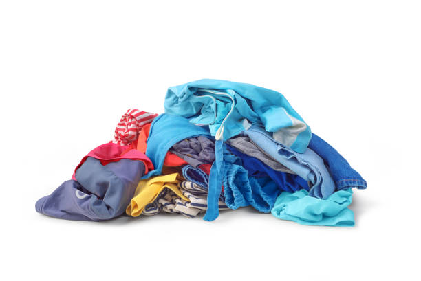 istock A pile of bright clothes isolated on white background 1073034680