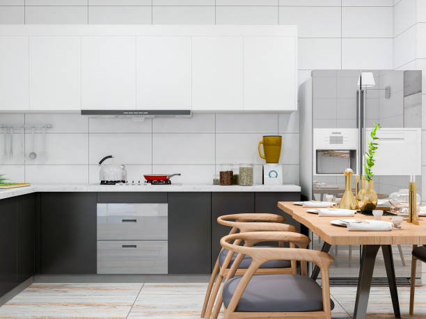 istock Modern apartment kitchen, solid wood dining table and dining chair in a spacious room, solid wood custom rail and refrigerator, various tools neatly placed 1073035084