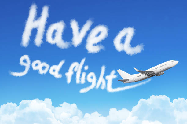 istock Flying a plane in the sky with the inscription - Have a good flight. 1073040930