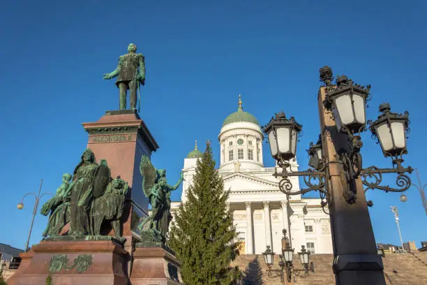 Helsinki Cathedral with a monument to Alexander II and streetlights