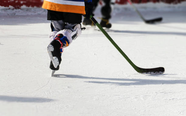 istock Kids at ice hockey practice. 1073045060
