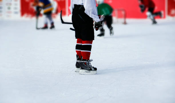 istock Kids at ice hockey practice. 1073045148