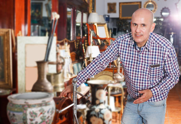 istock man visiting shop of antique goods 1073048410