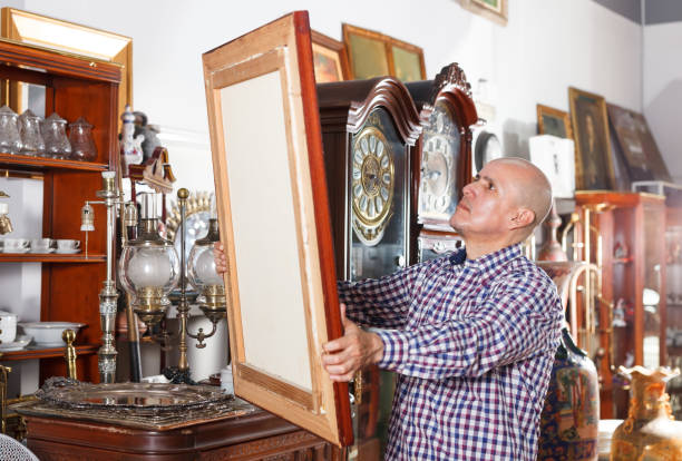 istock man pensively looking at  rare goods 1073048450