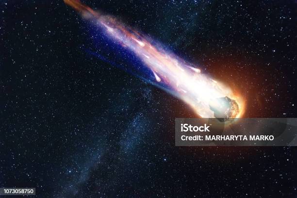 A Comet An Asteroid A Meteorite Falls To The Ground Against A Starry Sky Attack Of The Meteorite Meteor Rain Kameta Tail End Of The World Astranomy Stock Photo - Download Image Now