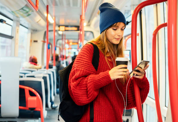 istock Young woman riding in public transportation 1073060874