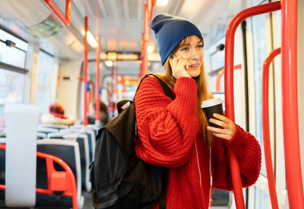 istock Young woman riding in public transportation 1073061158