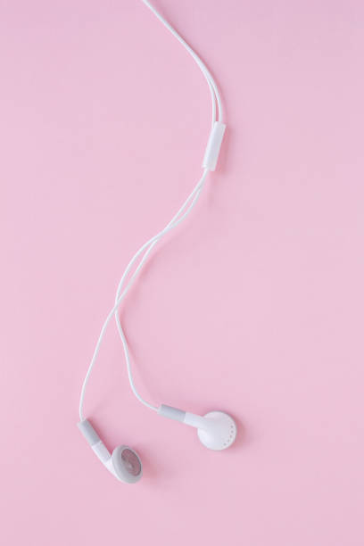 istock earbuds or earphones on pink background 1073068864