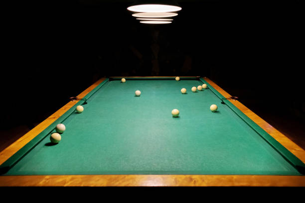 istock Billiard balls on a green pool table. 1073073144