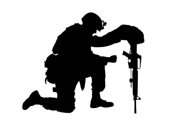 Sad soldier kneeling because of friend death Army soldier in sorrow for fallen comrade, standing on knee, leaning on rifle with helmet and two dog tags on chain, studio shoot isolated on white low key silhouette. Military funeral honors, grief for killed in action kneeling stock pictures, royalty-free photos & images