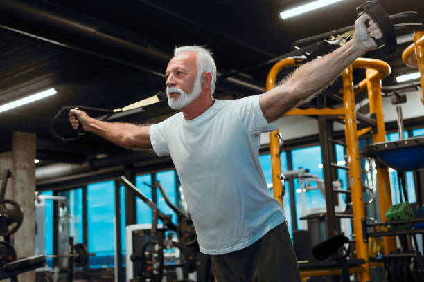 istock Senior man stretching with resistance band 1073077614