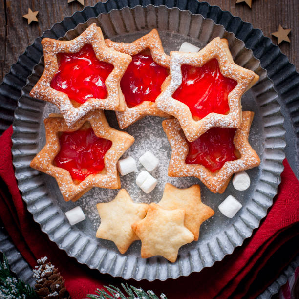 istock Christmas cookies. Linzer cookies with raspberry jam, sguare 1073084306