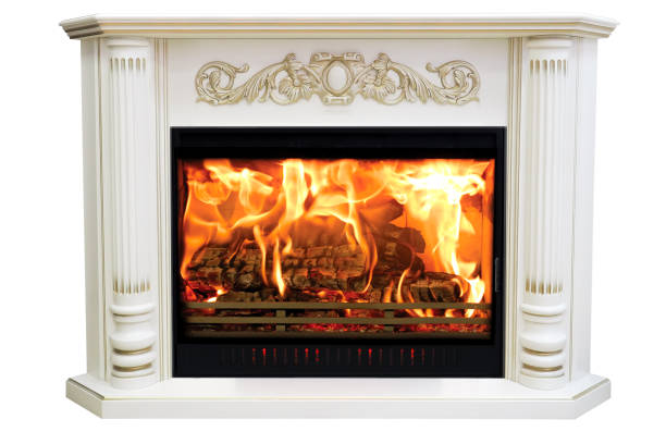 istock Burning classic fireplace of white marble. Isolated on white 1073086170