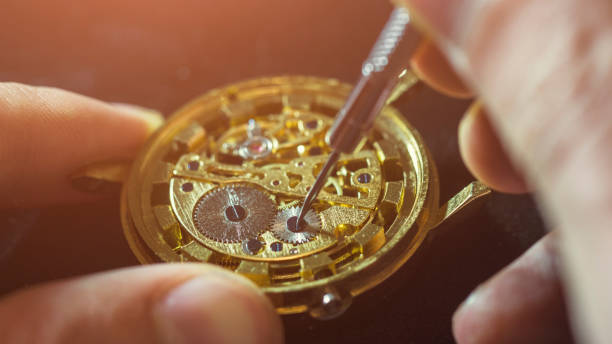 istock Process of installing a part on a mechanical watch, watch repair 1073086812