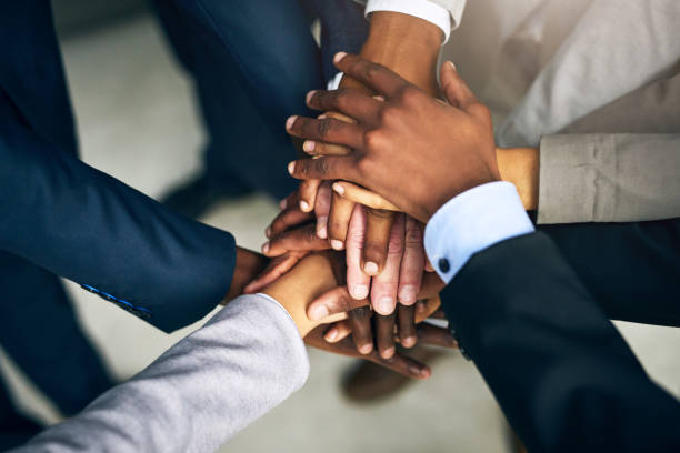 istock Let's stand together and achieve the impossible 1073089160