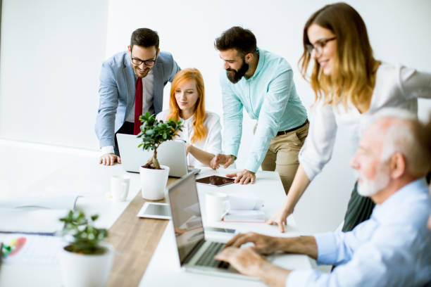 istock Business people discussing a strategy and working together in the modern office 1073093642