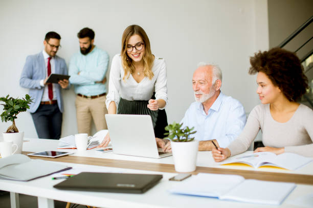 istock Business people discussing a strategy and working together in the modern office 1073094012
