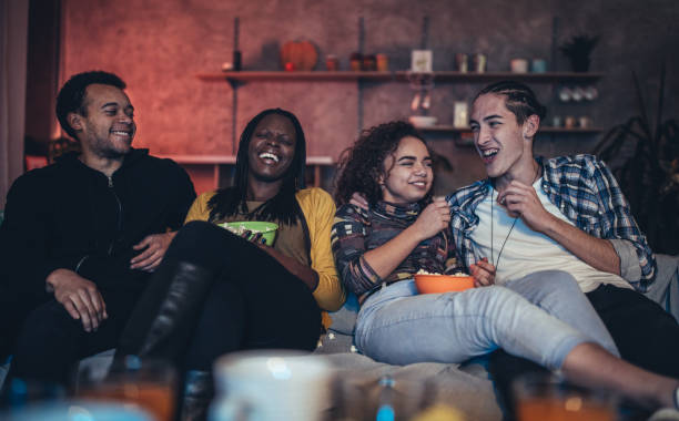 istock Friends having fun at home 1073095692