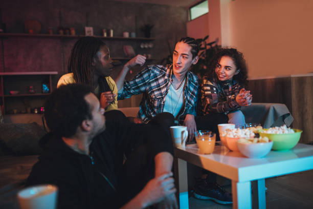 istock Group of friends at home 1073096052
