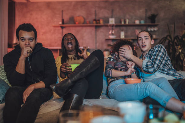 istock Watching a scary movie 1073097780