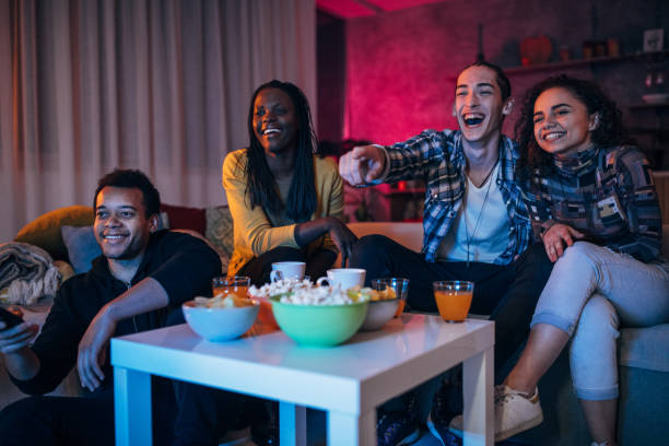 istock Friends watching a funny movie 1073101932