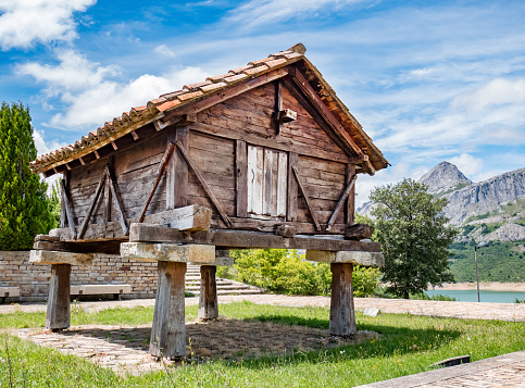 Horreo de madera antigua, típica construcción rural en España. Riano, provincia de León. Castilla y León, norte de España photo