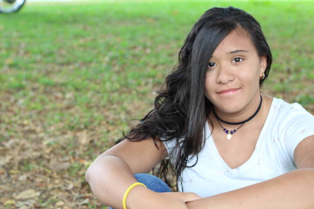 istock Mixed race young girl with copy space 1073110404