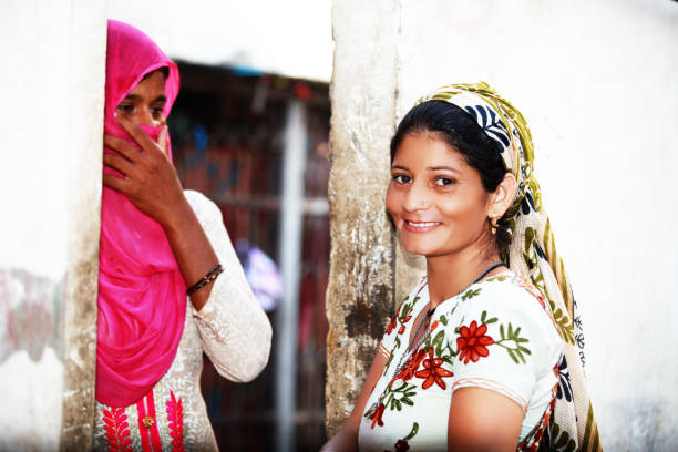 istock Two women discussing something at home 1073113414