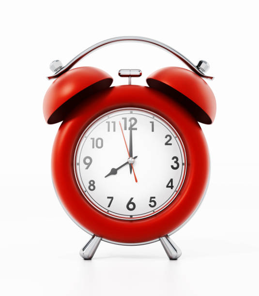 istock Retro styled red alarm clock isolated on white 1073114576