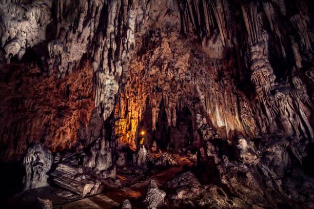 Caver in the Beautiful Colorful Cave