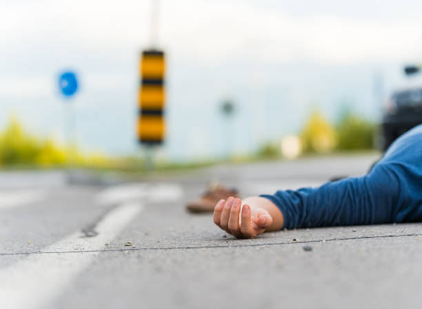 istock Traffic accident.Young man hit by a car 1073117856