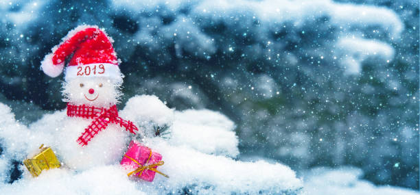 istock Happy New 2019 Year background with Snowman and fir tree. 1073117904