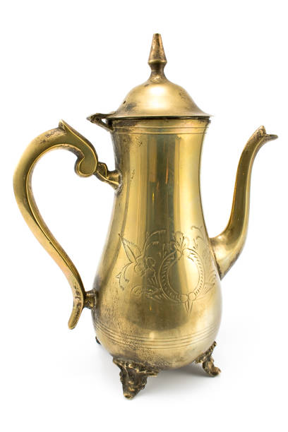 istock Antique silver teapot isolated on white 1073122502