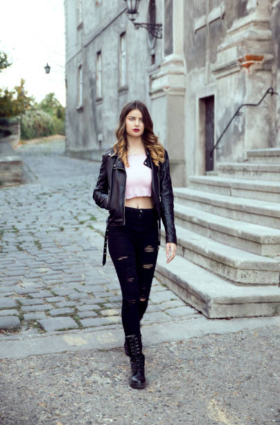 istock Young woman in leather jacket 1073125332