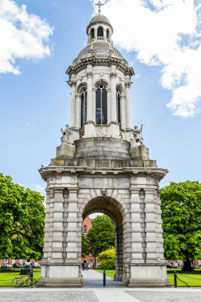Campanille bell tower at Trinity College in Dublin, Ireland Dublin, Leinster, Ireland - May 13, 2018: Campanille bell tower between Parlament and Library squares at Trinity College, close to buildings like Book of Kells, the Chapel, or the Examination Hall. trinity college library stock pictures, royalty-free photos & images