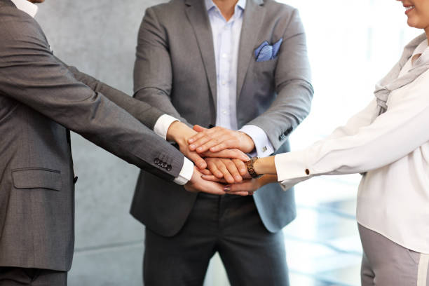 istock Group of business people sharing their ideas 1073129850