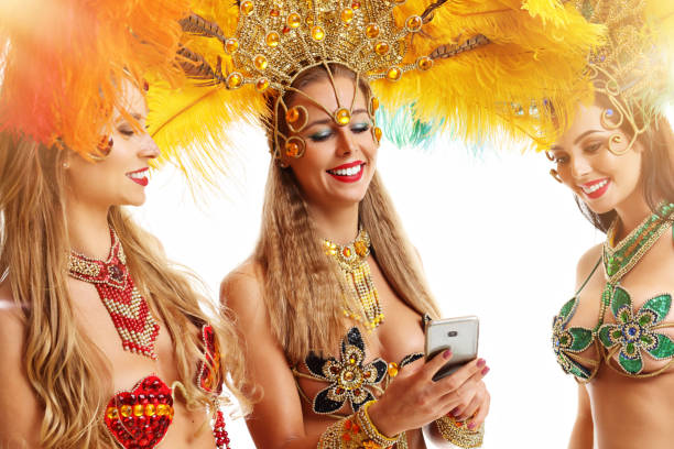istock Brazilian women dancing samba over white background 1073130564